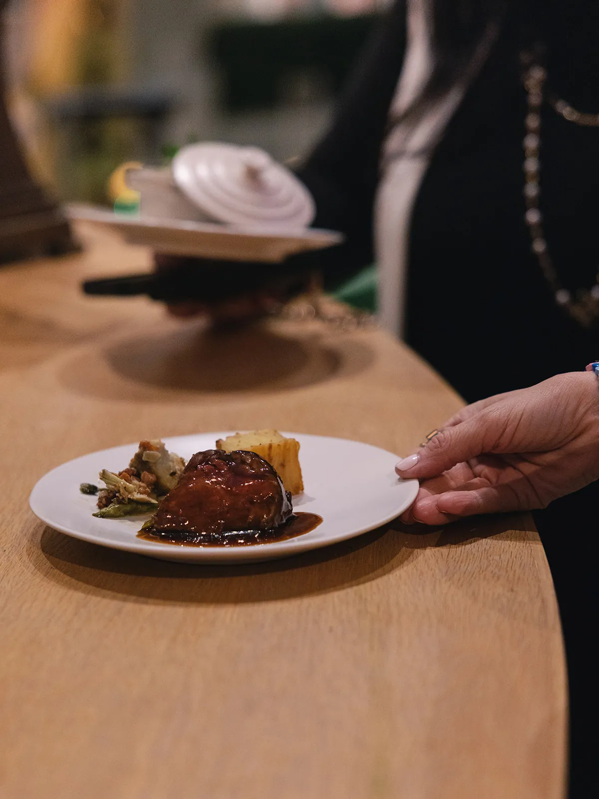A dessert plate carried to the table
